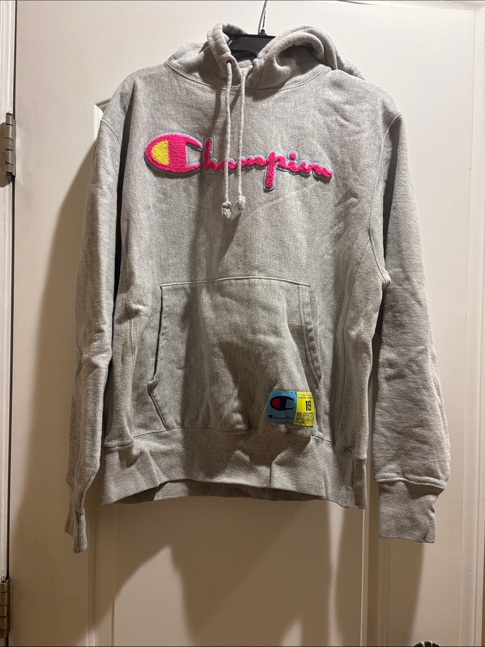 Champion Light Gray Hoodie with Pink & Yellow Logo
